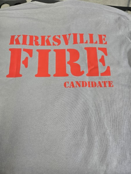 Gray shirt with 'KIRKSVILLE FIRE CANDIDATE' printed in red on the back.