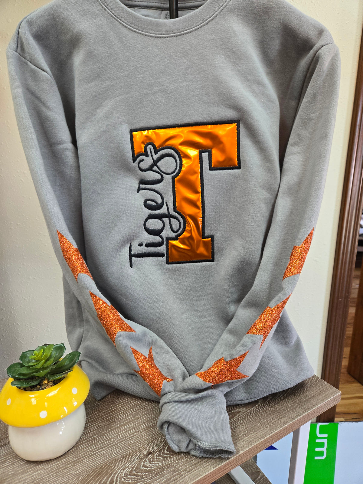 Tigers Gray Crewneck Sweatshirt | Metallic Orange T + Glitter Sleeve Stripes